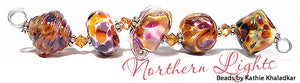 Northern Lights frit blend by Glass Diversions - beads by Kathie Khaladkar