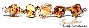 Sunglow frit blend by Glass Diversions - beads by Kathie Khaladkar